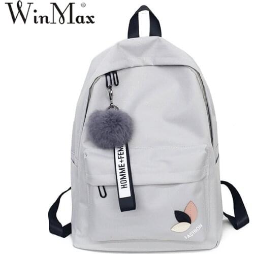 Factory Outlet Women teenage schoolbag Fashion Fur ball Girls backpack College Female High school student printing back pack bag