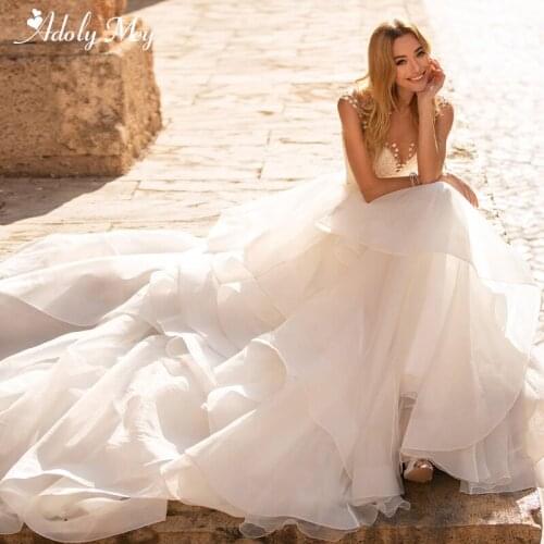 Adoly Mey New Arrival Romantic Scoop Neck Ruched Organza A-Line Wedding Dresses 2020 Luxury Beading Cap Sleeve Boho Wedding Gown