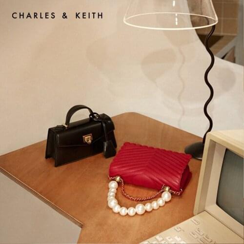 CHARLES&KEITH New Arrival for Spring2021CK2-80151021-1Womens shoulder bag with pearl decoration V-shaped pattern cover handbag