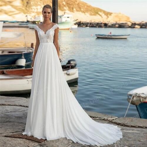 Bohemian Lace Wedding Dresses Robe De Mariee Sexy A Line Beach Wedding Dresses Plus Size Cap Sleeve Scoop Backless Bridal Gowns