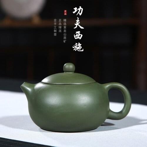 Yixing purple sand teapot wholesale in rain