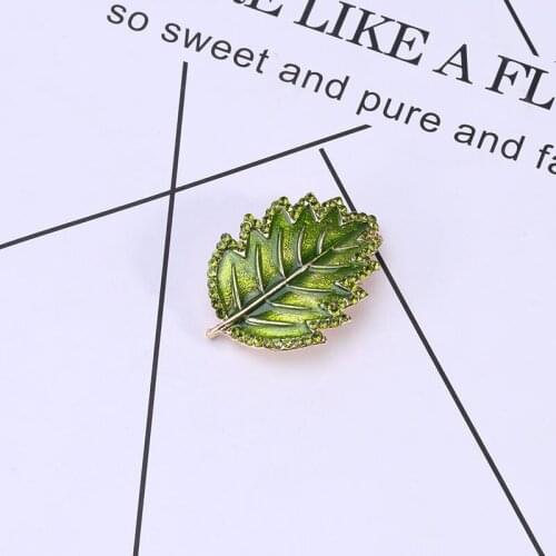 Korean version of dripping enamel leaf brooch simple and versatile small fresh wedding dress accessories gifts
