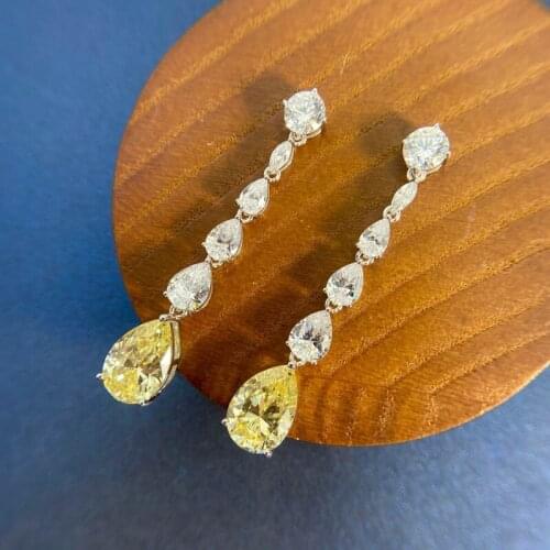 New Yellow Diamond Earrings 925 pure silver high carbon diamond inlaid with 9 * 13 water drop shaped main explosive stone