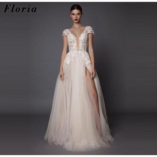 Boho Bride Wedding Dresses 2021 Lace Flowers Middle East Bridal Gowns Sheer Appliques Split V-Neck Bridal Gowns Kaftans Backless