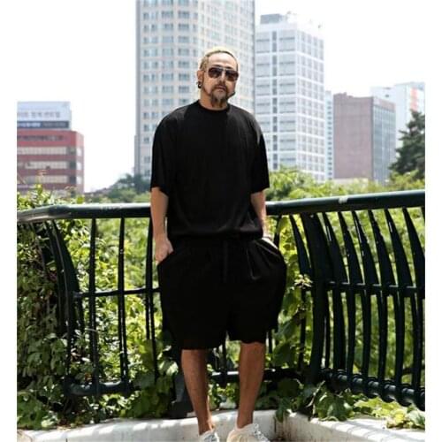 2021 mens new summer solid color pleated high elastic fashion shorts fashion tide brand loose straight beach pants