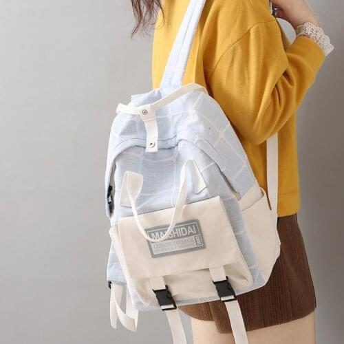 Large capacity backpack backpack female ins joker han edition of high school students' grid small pure and fresh and backpack