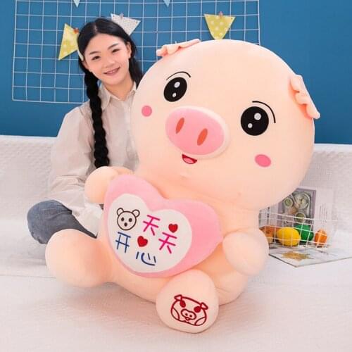 40-55 cm cartoon heart-caring pig plush toy cute soft pig doll pillow large girl sleeping with doll