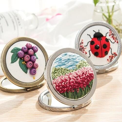 Embroidery makeup mirror creative production handheld folding bedroom decoration mirror convenient to carry makeup accessories