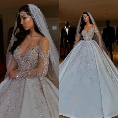 Vintage African Wedding Dresses Luxurious Sheer Neck Long Sleeves Bride Dresses Beaded Sequins Satin Wedding Gowns