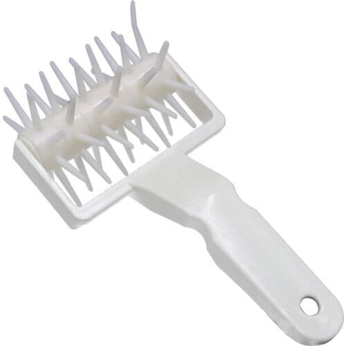A Kitchen Dining or Bar Baking Tool Pizza Needle Roller Hole Puncher Plastic Handle Hole Puncher Tool