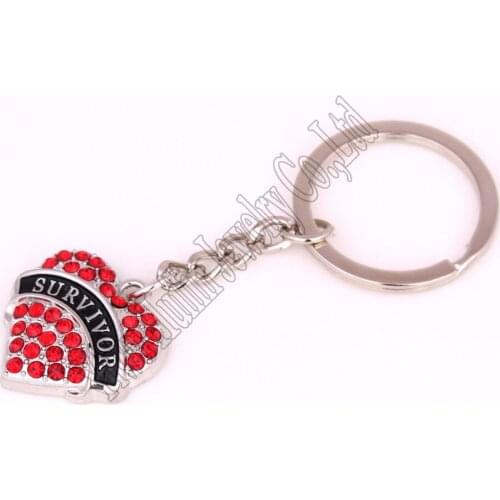 Zinc alloy studded with sparkling crystals SURVIVOR charm key chain