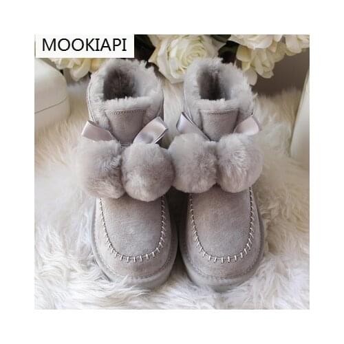 New sheepskin and wool anti-skid thick-soled butterfly knot wool ball warm cotton shoes, snowshoes, free delivery