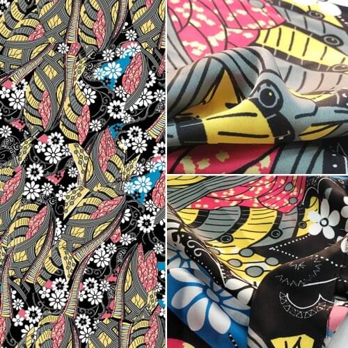 Spring new printed fabric European brand, black background and white flowers, sewing fabric factory stores are not out of stock