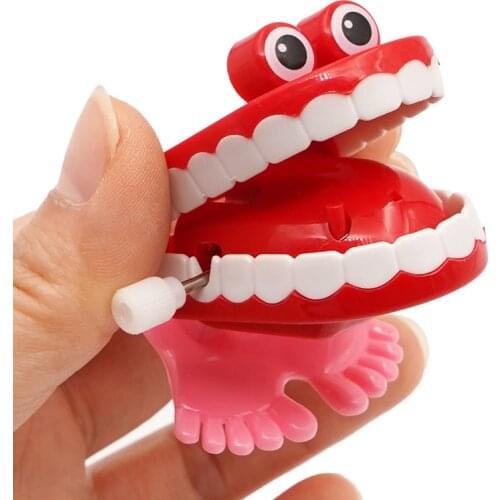 Creative Funny Plastic Jumping Teeth Upper Chain Clockwork Toy Baby Kids Walking Spring Wind Up Toy For Children Dental Gift Toy