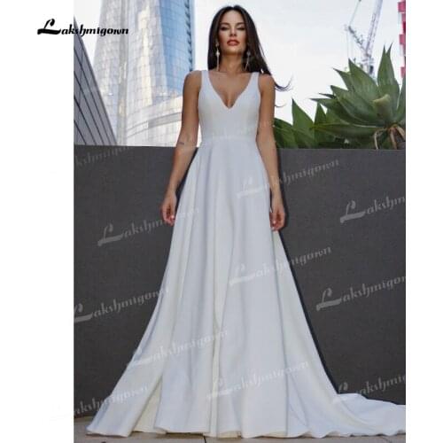 A-Line/Princess Soft Satin Wedding Dresses Sexy Low V-Neck Ruffles Straps Sleeveless Pocket ​Sweep/Brush Train Simple Bride Gown