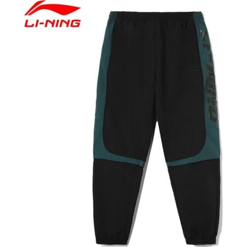 Li-Ning Men The Trend Track Pants Water Repellent 100%Nylon AT PROOF SMART Drawstring Pockets LiNing Loose Sports Pants AYKR405