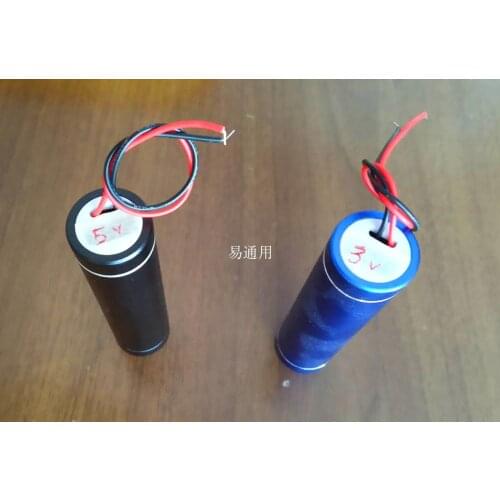 Hand-held linear shaking generator with hand shaking vibration for power generation: low frequency and high amplitude environmen