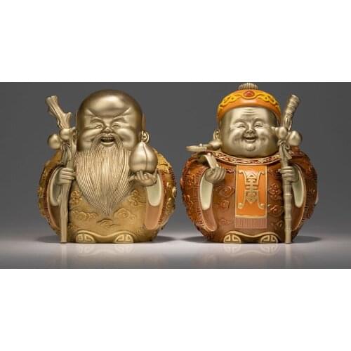 The home gift decorations of the little bronze man symbolize longevity and happiness