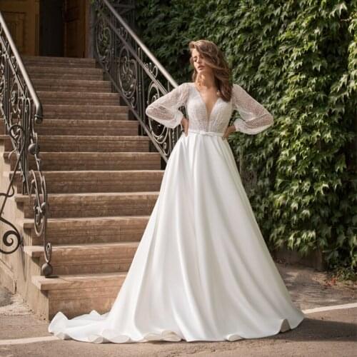 Luxury Long Puff Sleeve Wedding Dress V Neck A Line Pearls Elegant 2021 Bridal Gowns Sweep Train Backless Custom Made