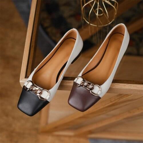 The New Line For Autumn 2021 Is A Simple And Fashionable Womans Shoe With A Shallow Mouth And Metal Decoration