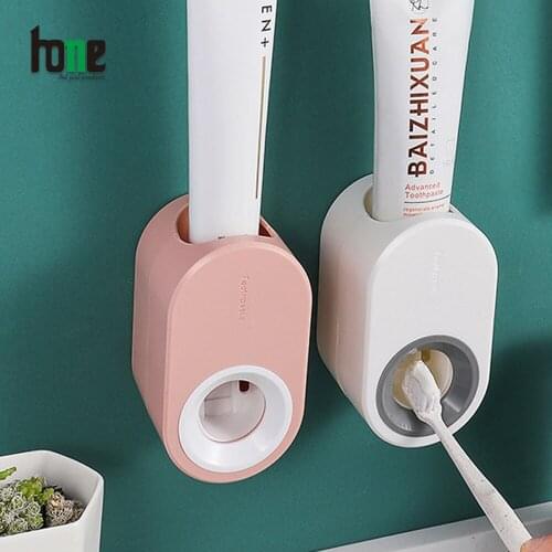 Toothpaste Dispenser Tooth Paste Squeezes Holder Tubes Wall Mounted Dust-Proof Plastic Bathroom Accessories Home Tools 2021