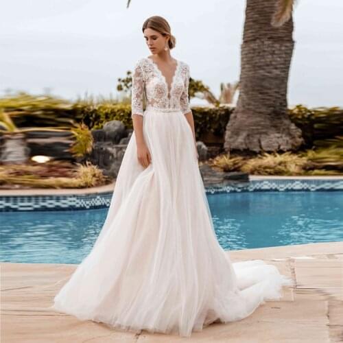 Deep V-neck France Lace Top A-line Half Sleeves Nude Wedding Dress Lower Back Beach Bridal Dress vestido de novia encaje
