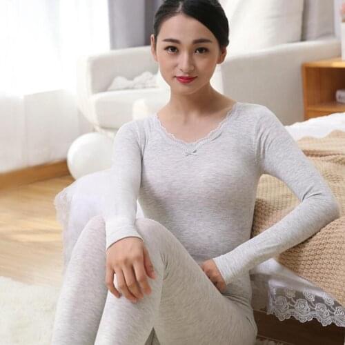 The new lady V collar thermal underwear set is made of cotton, thin, seamless body, lace and lace