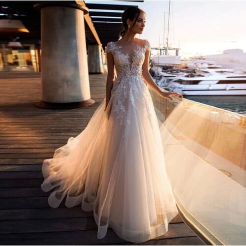 Elegant Wedding Dress 2021 A-Line Sheer Neck Cap Sleeve Lace Appliques Button Tulle Sweep Train Bride Gown Vestidos De Noiva