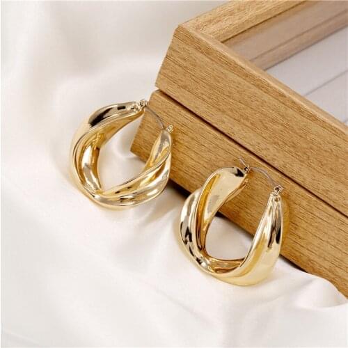 Korean version of the metal wind geometric metal stud earrings go with the earrings woman