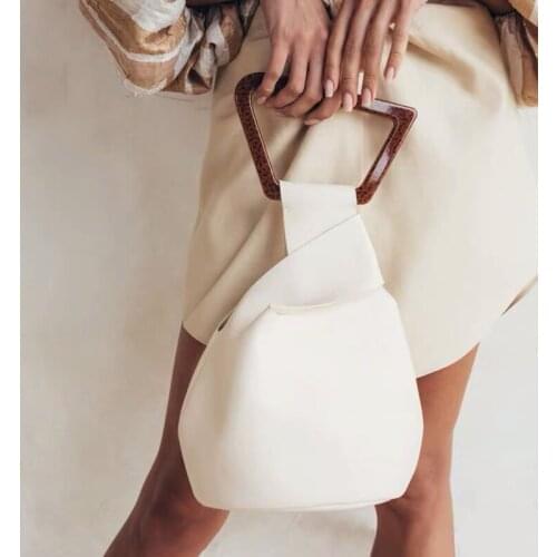 Personalized Acrylic Handle Womens Handbags High Quality Leather Solid Women Hand Bags 2019 New Irregular Bucket Bags Purses