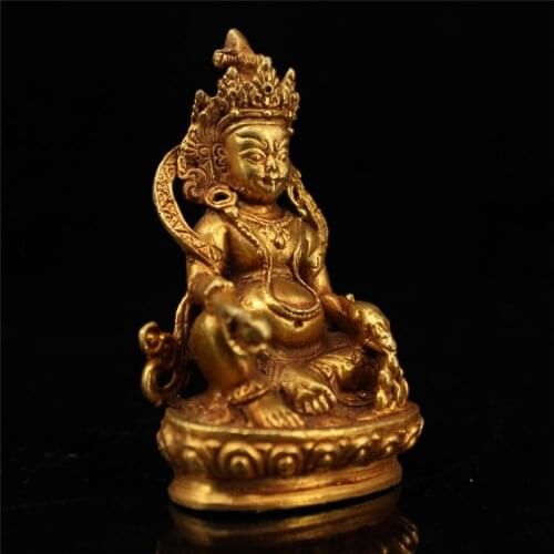 Pure handmade copper, gold and yellow God of wealth collected in Nepal
