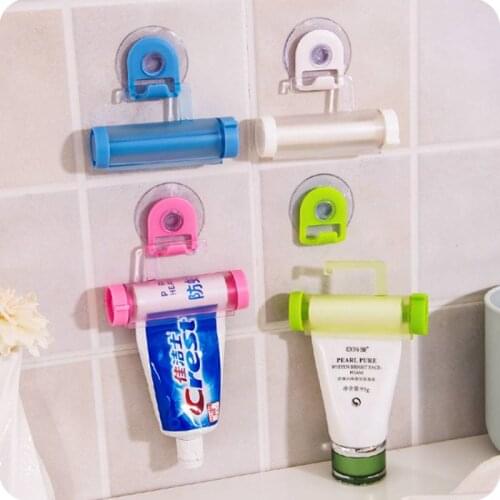 Plastic Toothpaste Dispenser Sucker Holder Rolling Tube Squeezer Dental Cream Bathroom Manual Syringe Gun Dispenser