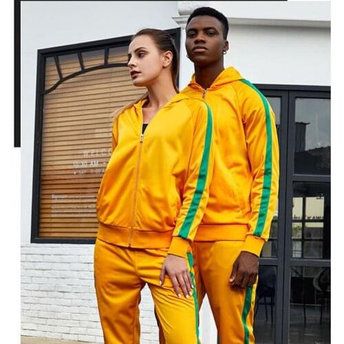 Autumn and winter new leisure sports suit hooded warm golden velvet jacket trousers leg pants zipper