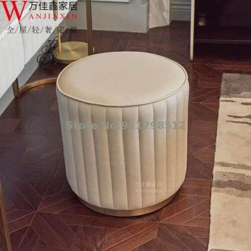 Postmodern minimalist dressing stool golden stainless steel leather art small round stool bedroom light luxury makeup stool shoe
