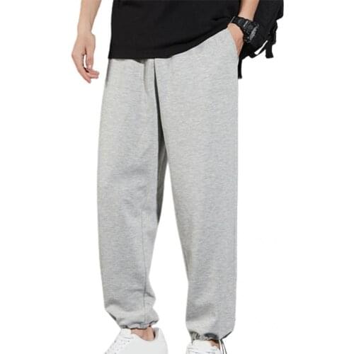 Smooth Trendy Mid Rise Ankle Banded Sports Pants Quick Drying Casual Pants Loose Male Clothing