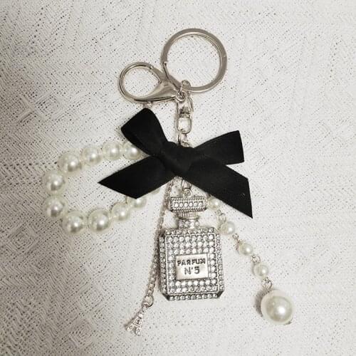 Pearl Bottle Number 5 Keychain For Woman Luxury Jewelry Bow Car Keyring Bowknot Camellia Pearl Pendant Keychains Bag Decoration