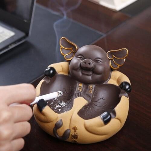 Ceramic purple sand tea pet jewelry beautiful creative personality fun pig ashtray desktop decoration