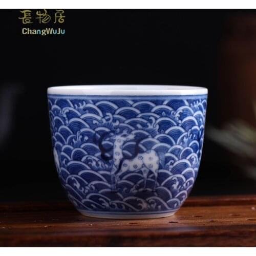 Changwuju in Jingdezhen the hand painted blue and white Kung-Fu tea cup firing in the firewood kiln for host use