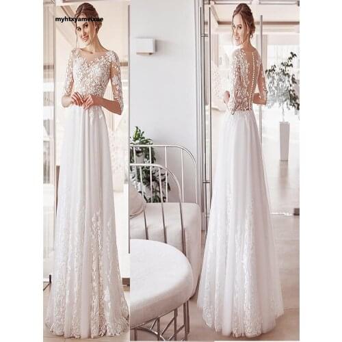 2021 white lace applique O-neck vintage bridal gown with buttoned tulle half sleeves and floor length A-line wedding dress