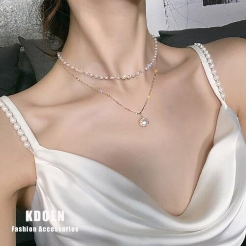 European and American fashion double pearl pendant female Necklace sexy girl clavicle chain unusual Christmas party neck chain