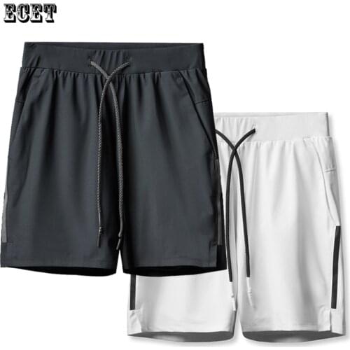 Summer quick-drying fitness mens sports pants solid color beach casual pants jogger brand multi-pocket mens shorts