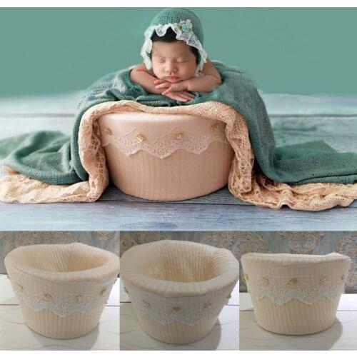 A newborn photography prop beige soft and comfortable sitting basket assisted photo accessory