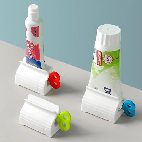 1/2 Pcs Rolling Tube Toothpaste Squeezer,Toothpaste Seat Holder Stand Rotate Toothpaste Dispenser for Bathroom