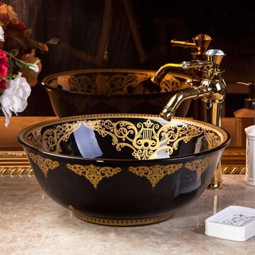 China Artistic Handmade ceramic sink wash basin Ceramic Counter Top Wash Basin black with gold ceramic wash basin Bathroom Sink