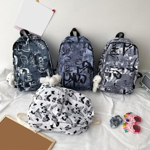 Graffiti Butterfly Printing Oxford Cloth Backpack with Bear Pendant Leisure Ladies Preppy Style Large Capacity School Bag