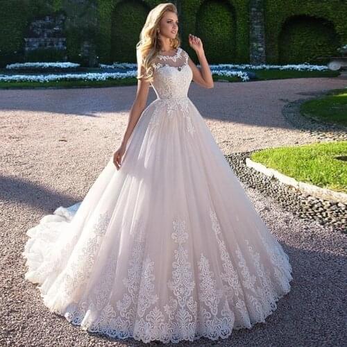 Boho Wedding Dresses Ball Gown Cap Sleeves Tulle Appliques Lace Dubai Arabic Wedding Gown Bridal Dress Vestido De Noiva