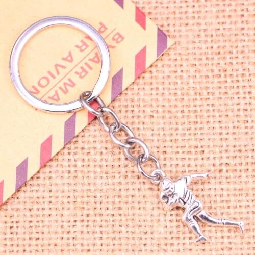 20pcs New Fashion Keychain 30x13mm soccer player sporter Pendants DIY Men Jewelry Car Key Chain Ring Holder Souvenir For Gift