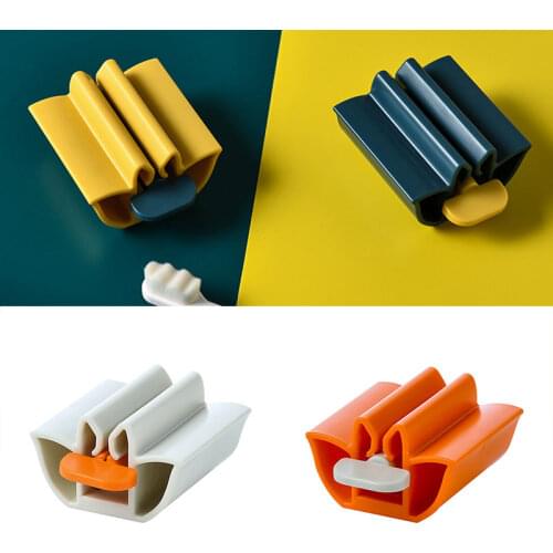 Rolling Tube Toothpaste Squeezer Facial Cleanser Press Manual Toothpaste Clip Seat Holder Stand Rotate For Bathroom Accessories