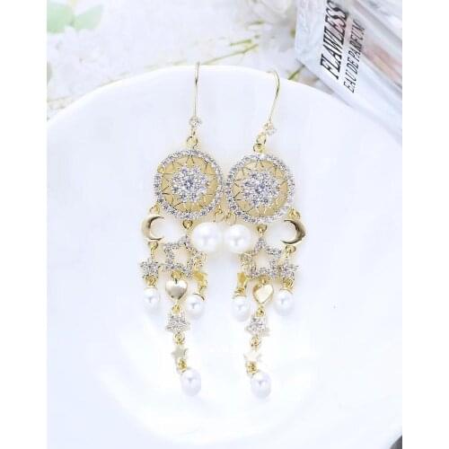 Free Ship New Bohemian Style Dream Catcher Net Earrings Female Design Sense Earrings Lazy Tassel Earrings