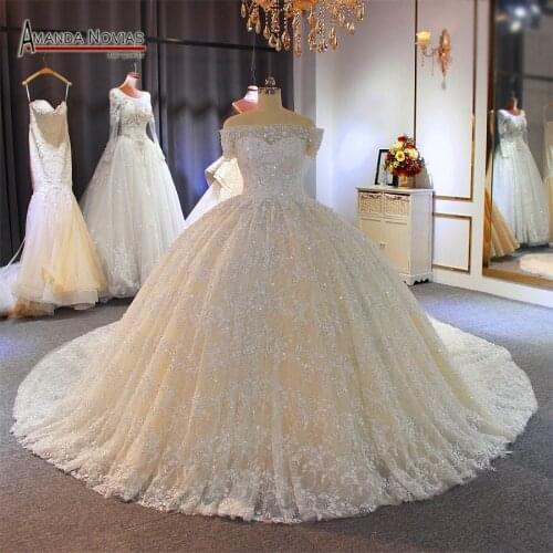 Full beading and pearls ball gown wedding dress 2020 off the shoulder short sleeves